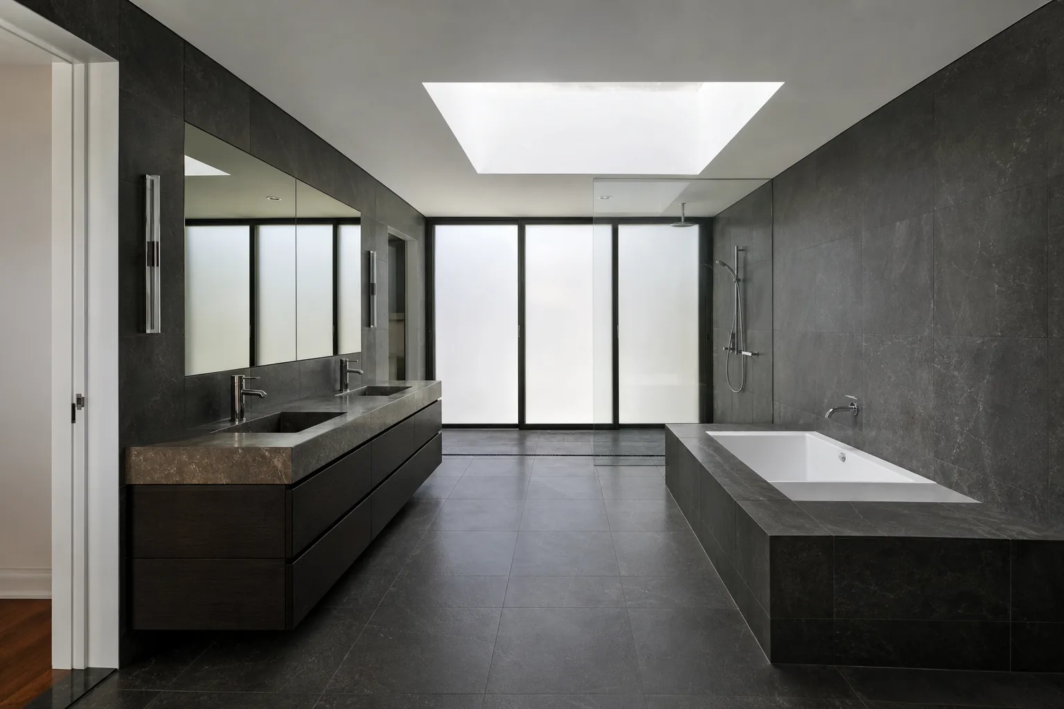 Representative premium modern bathroom concept before renovation in dark stone
